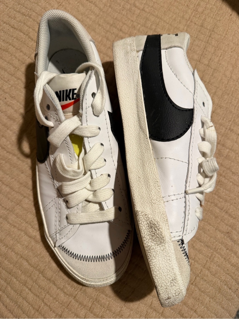 Nike Kids White Sneakers with Black Swoosh